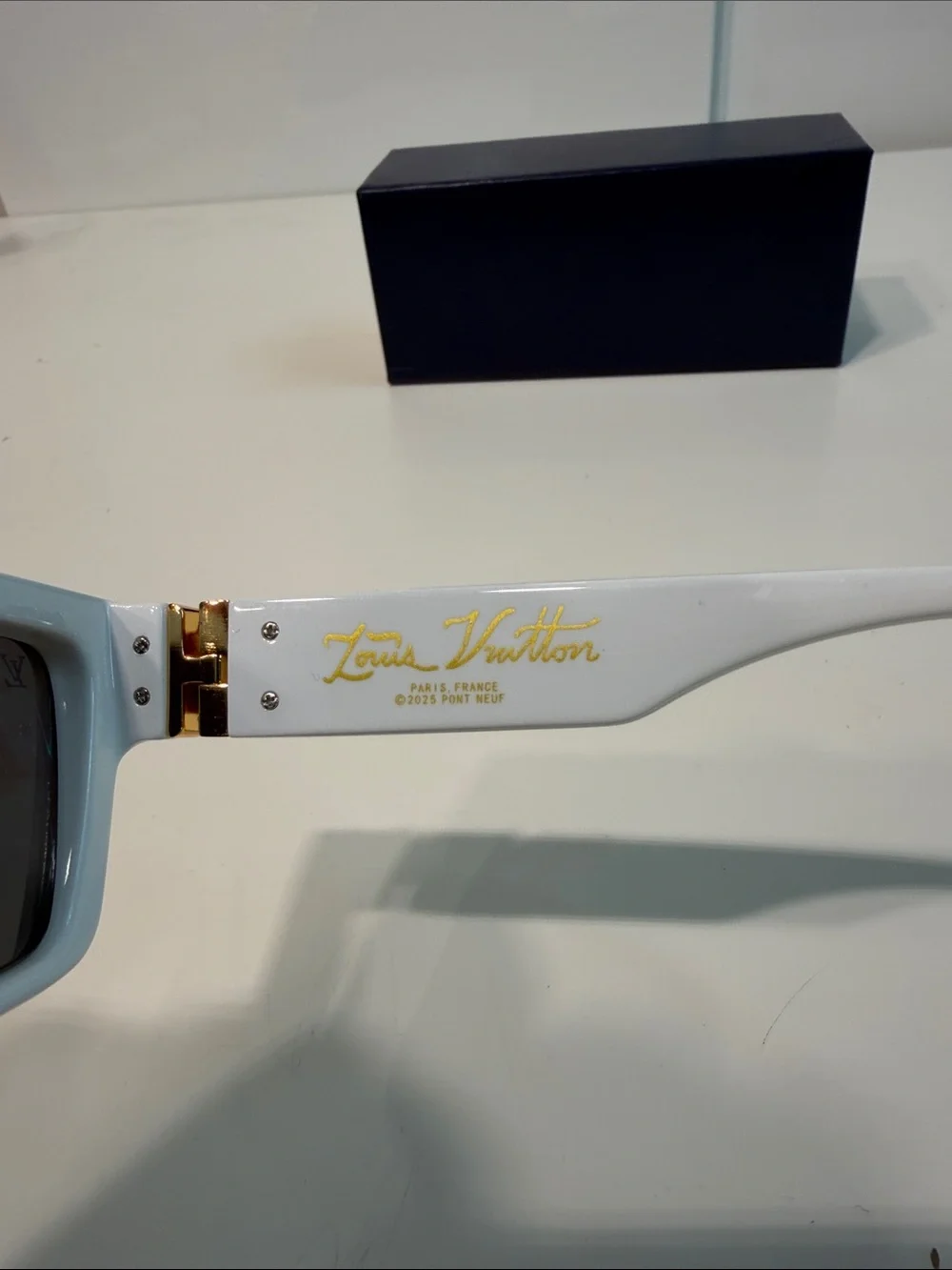 Gently used Men’s LOUIS VUITTON 1.1 Millionaire Sunglasses White Lv shades